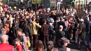 Argentina’s Milei rushed away from rally as protesters throw rocks