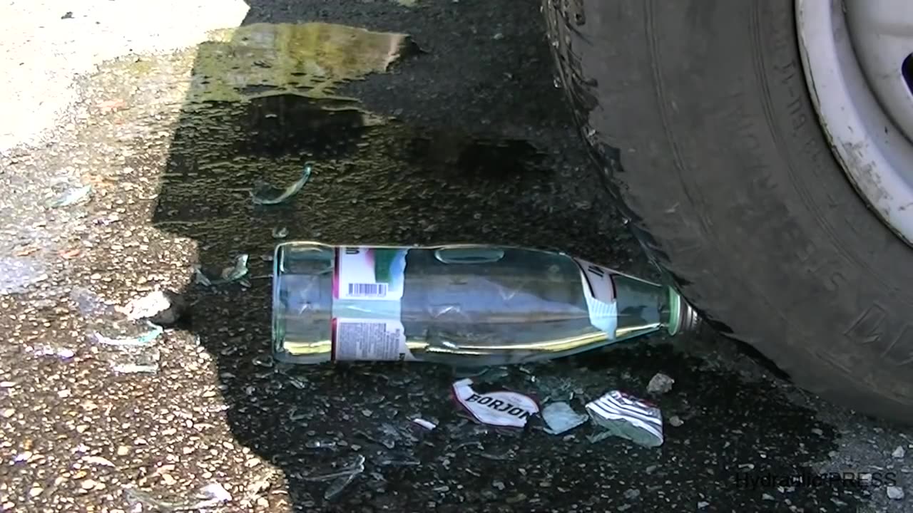 Glass Bottles vs. Tire