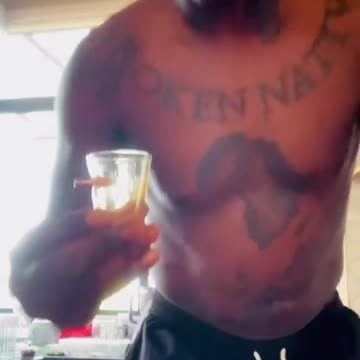 Israel Adesanya Makes a 'Black' Joke and Calls His Drink the 'Kirk Shot'
