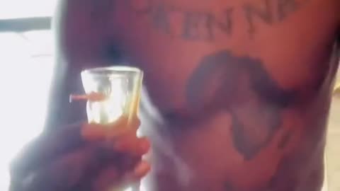 Israel Adesanya Makes a 'Black' Joke and Calls His Drink the 'Kirk Shot'