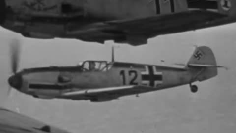Messerschmitt Bf 109 E fighters escort a Heinkel He 111 in 1940
