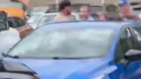 Man carrying stops the man that stabbed 11 people at a Walmart in Michigan