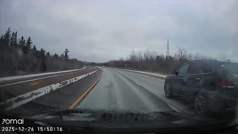 Car Driving on the Wrong Side of the Highway