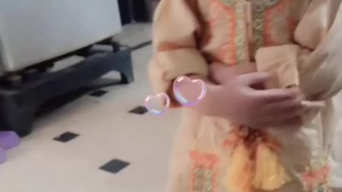 Baby is praying wearing hat, says some prayer words