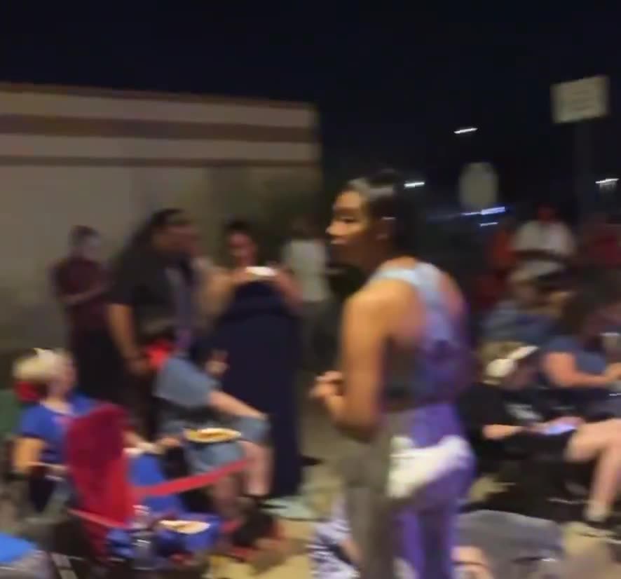 A LONG LINE HAS FORMED outside of State Farm Stadium in Arizona ahead of Sunday’s