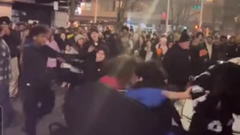 brawl breaks out outside the Seattle Space Needle during NYE fireworks