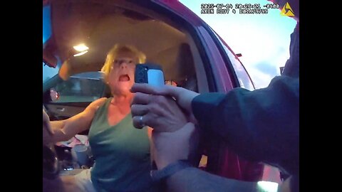 Woman is Furious With Officers During Traffic Stop, Then Drives Off