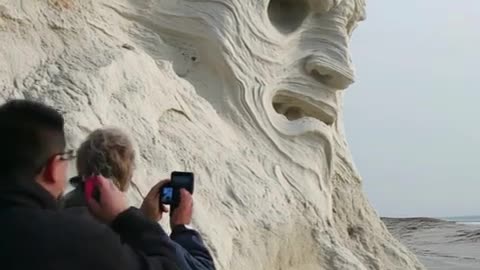 Faces on Sand. Please like and follow!