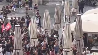 In France, French women waving French flag are attacked by far left and Islamists.