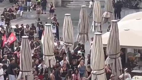 In France, French women waving French flag are attacked by far left and Islamists.