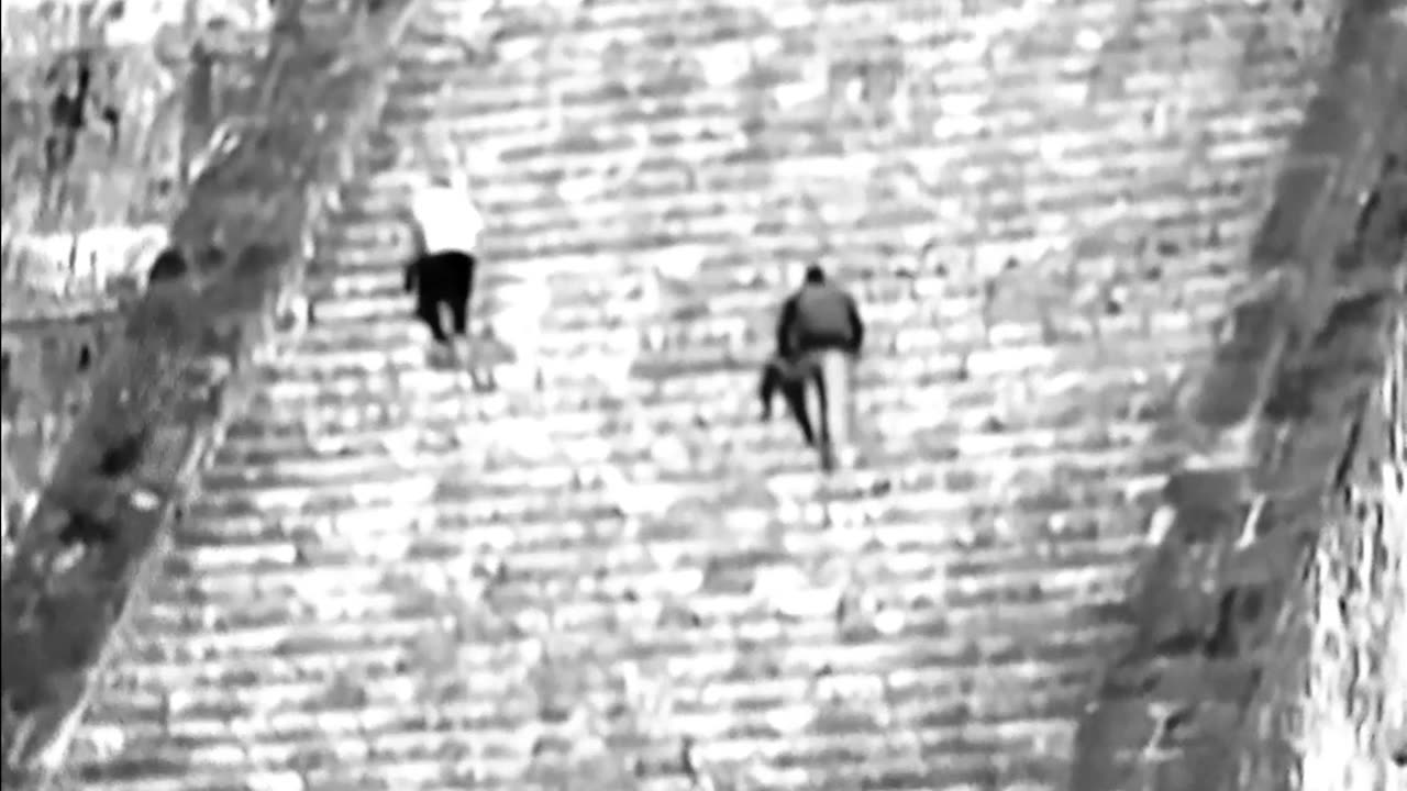 Dummy tourists climb up ancient Mayan pyramid