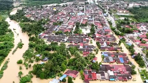 Drone view shows severe floods as 15,000 displaced in Malaysia