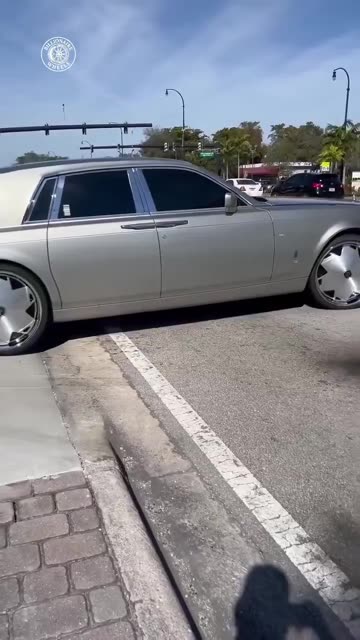Car with special rims looks like it's not moving at all