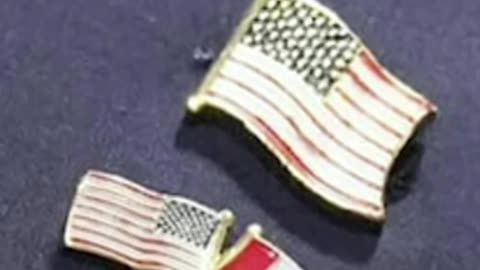 Trump seen with interwoven Flag Lapel Pin