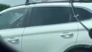 Man attempts to charge his EV with fans attached to roof