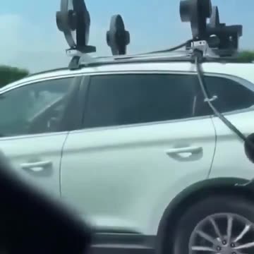 Man attempts to charge his EV with fans attached to roof