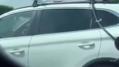 Man attempts to charge his EV with fans attached to roof