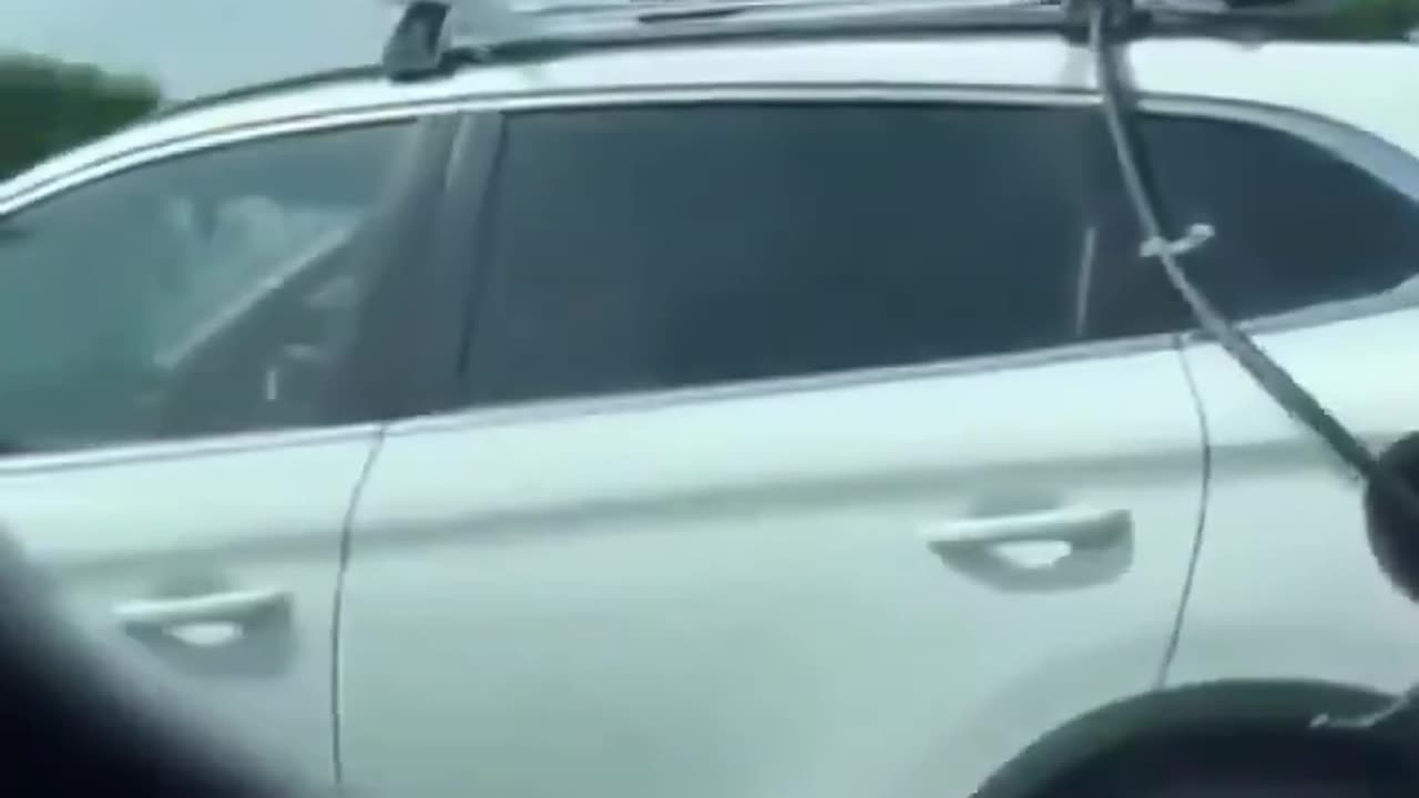 Man attempts to charge his EV with fans attached to roof