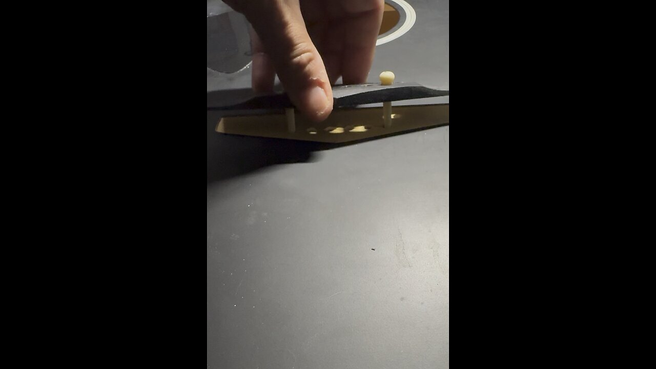 Vangoa guitar bridge repair. Scoring the top to expose bare wood