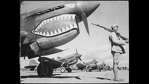 A Chinese soldier guards American P-40 planes