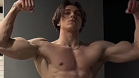 Handsome muscular man flexing muscles