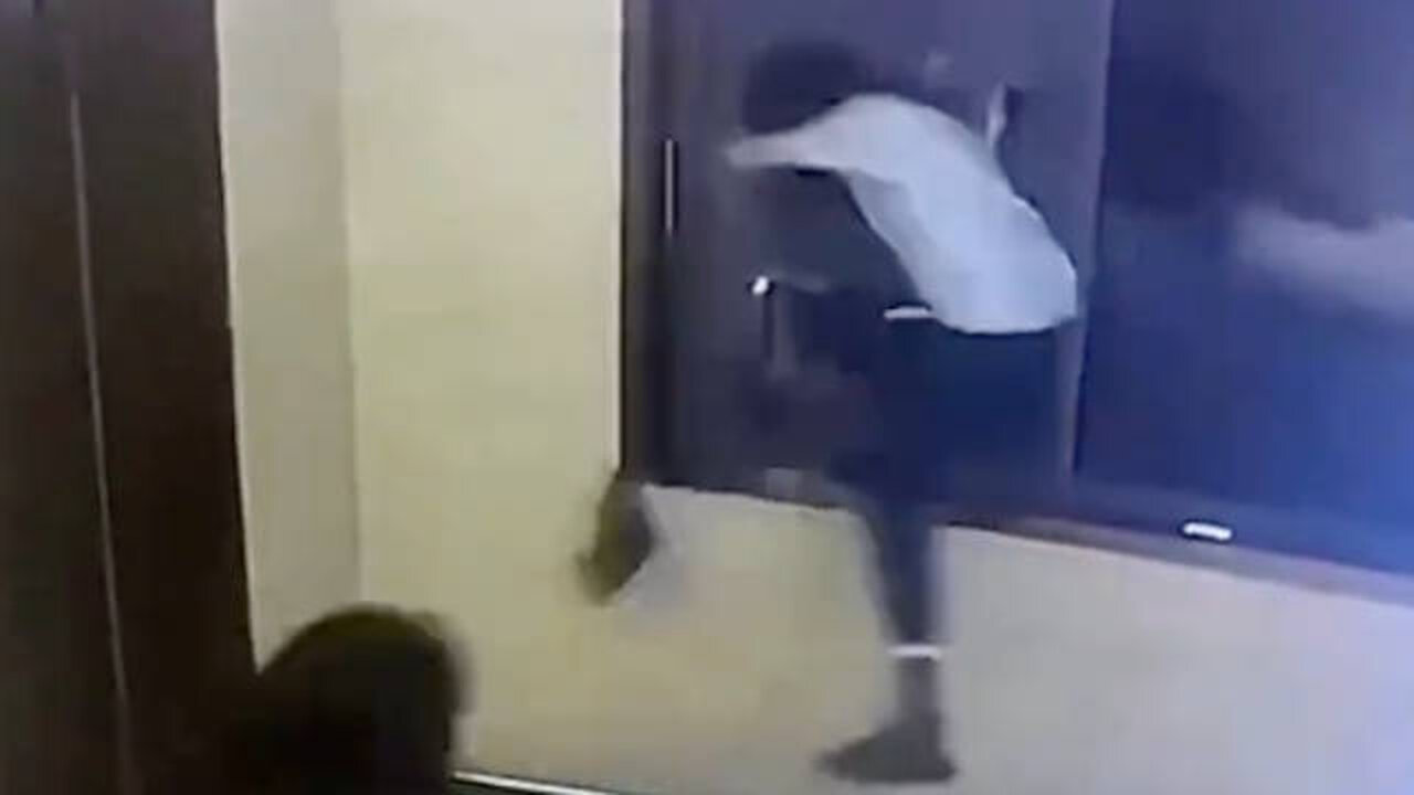 Man Jumps Through Window During Argument with Wife