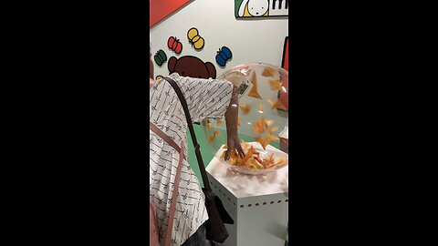 Playing Miffle At Changi Airport