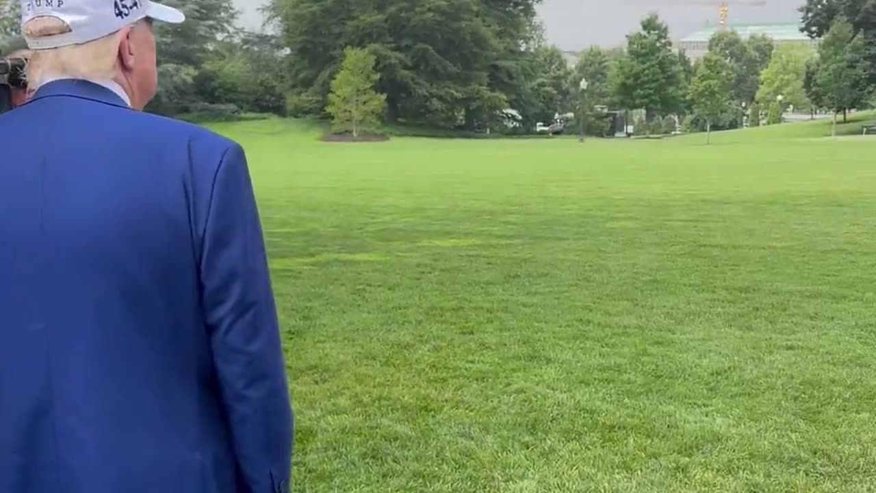 President Donald J. Trump speaks to the media as the new flagpole is installed on the South Lawn