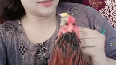 Beautiful girl with hen
