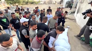 Palestinians mourn loved ones killed in Israeli strike on Gaza City