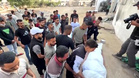 Palestinians mourn loved ones killed in Israeli strike on Gaza City