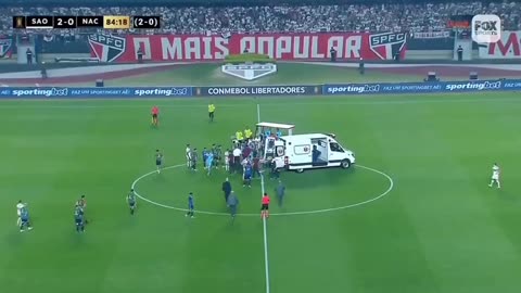 Another soccer player collapses on the field.