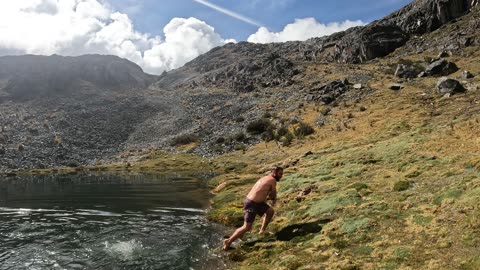 Jumping in a mountain lagoon #Andes #Mountains #Peru