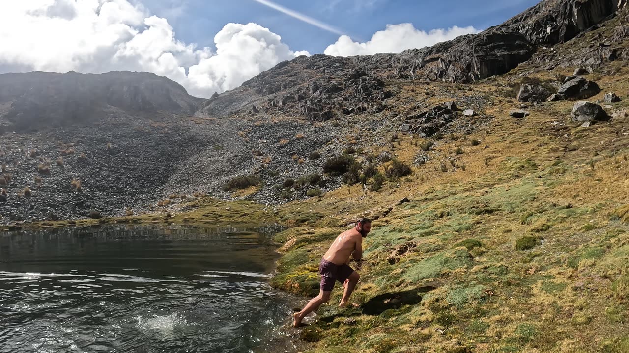 Jumping in a mountain lagoon #Andes #Mountains #Peru