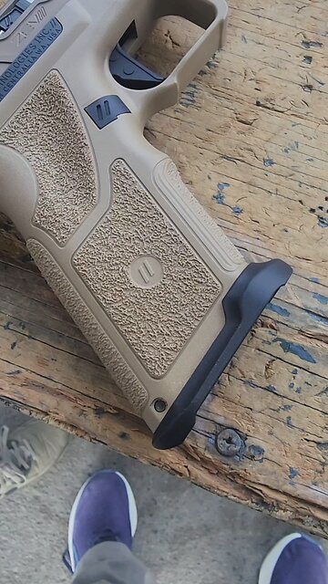 Zev OZ9-C with Griffin Armament Resistance Suppressor