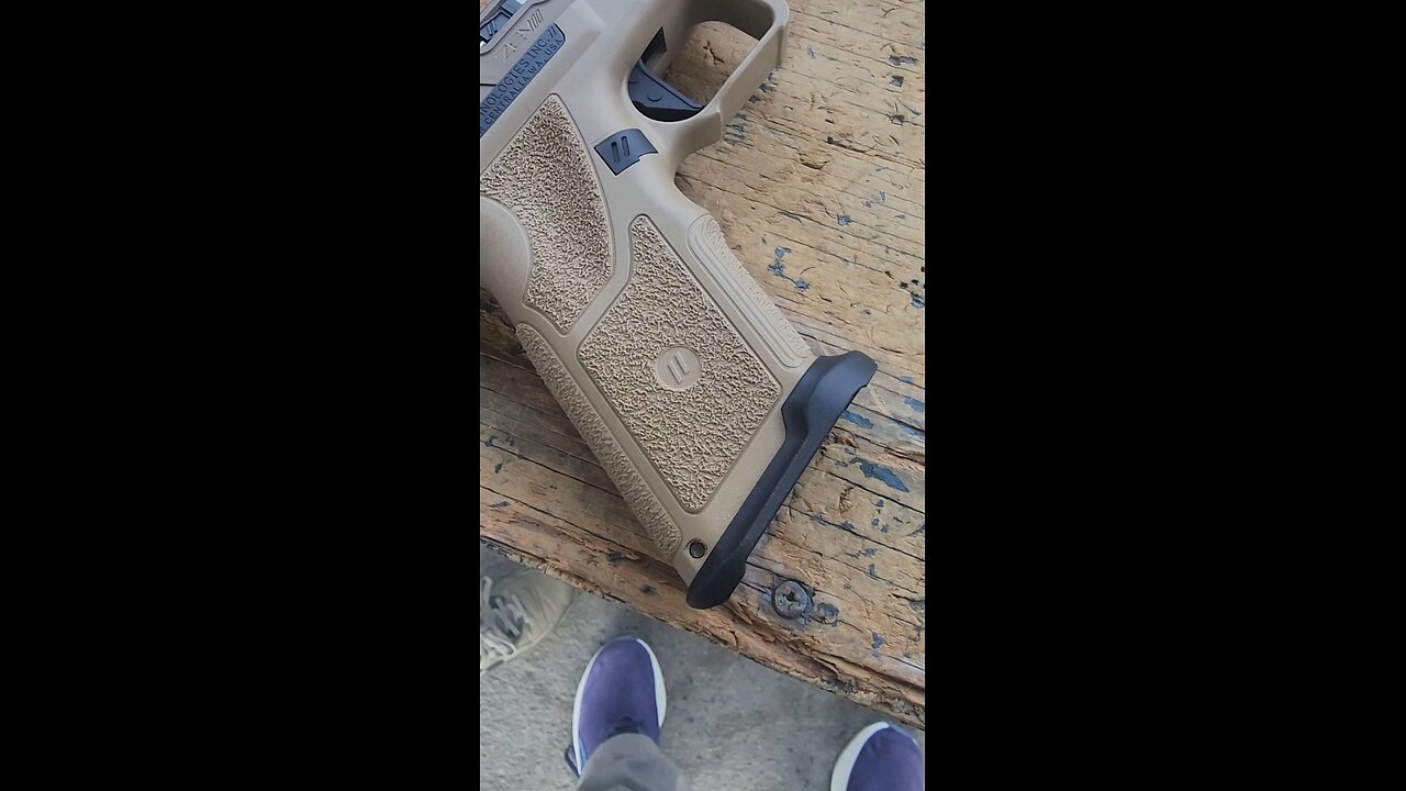 Zev OZ9-C with Griffin Armament Resistance Suppressor