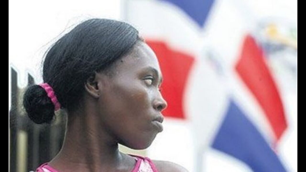 Haitian woman makes a face without permission on the beach