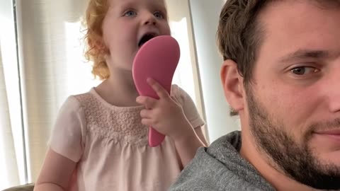 Interesting Way to Wet a Hairbrush