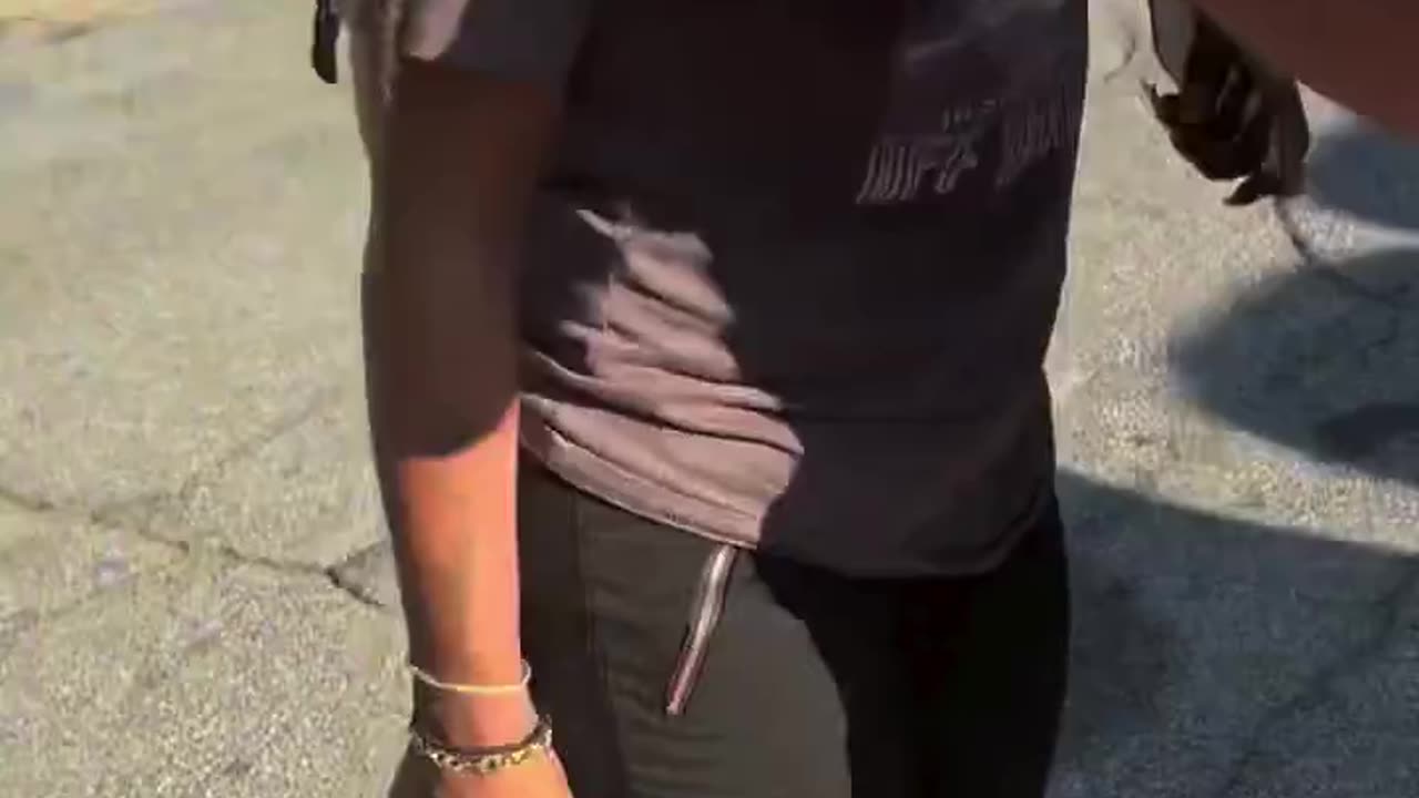 Black woman does a hit-and-run and points a gun.