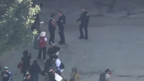 Anti-ICE students attack and injure federal agent in protest in downtown Los Angeles, California