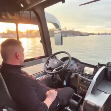 An amphibious bus in Hamburg Germany that drives on roads and cruises the river for tours