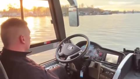 An amphibious bus in Hamburg Germany that drives on roads and cruises the river for tours