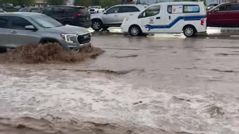Ambulance Navigates Flooded Streets in Fort Mohave, Arizona