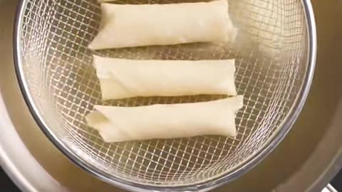 Making a crunchy Spring roll cheese snack recipe