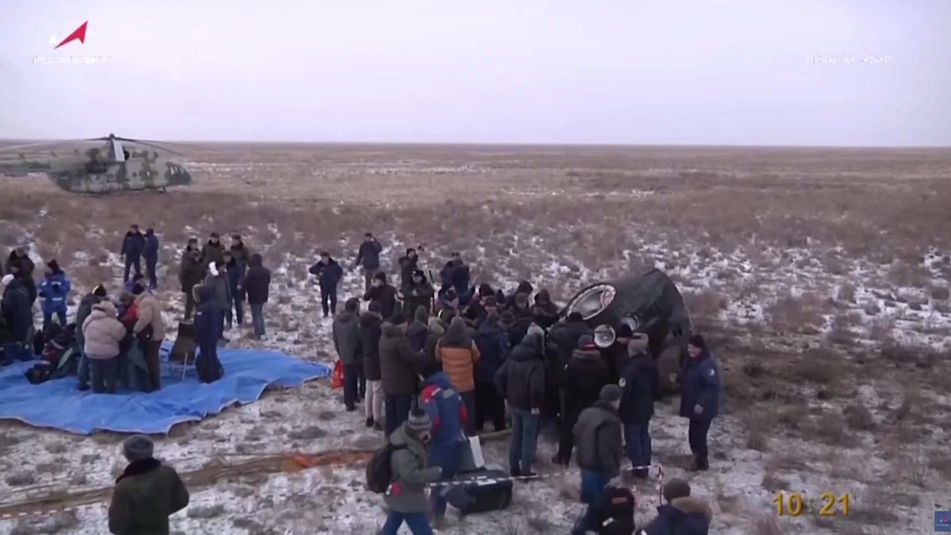 Soyuz spacecraft brings Russians, American back to Earth