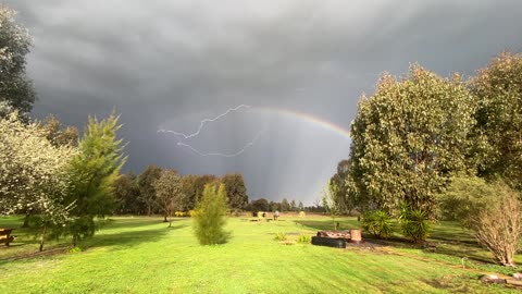 Lightning and Rainbow over Jaya