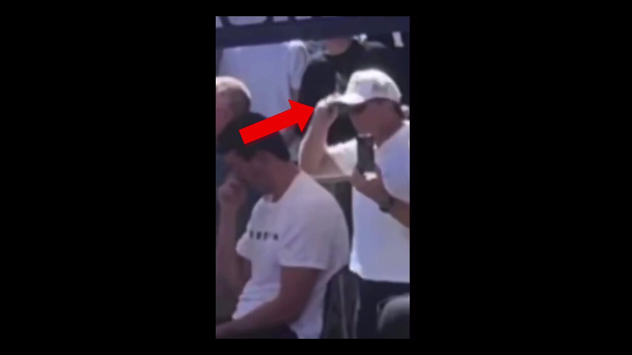 Watch closely: 1. The man in front tips his hat. 2