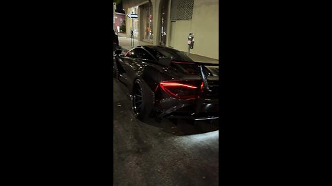Midnight Vibes: Sleek Black Sports Car Shine & Gate Reveal”