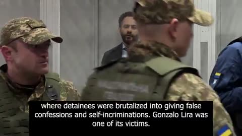 Jailed Ukranian politician addresses America from a cell in court about the coverup of the deat