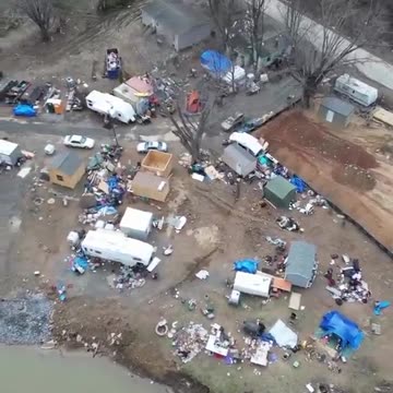 Trump wears a blue suit to a funeral, 1,000 think pieces. Biden's NC tents crisis? Silence.